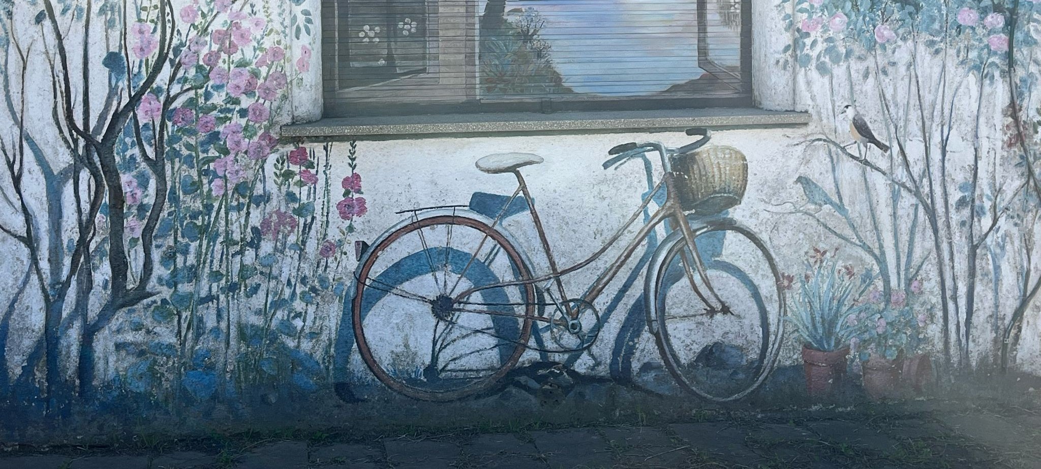 Mural tradicional de bicicleta en 25 de Agosto